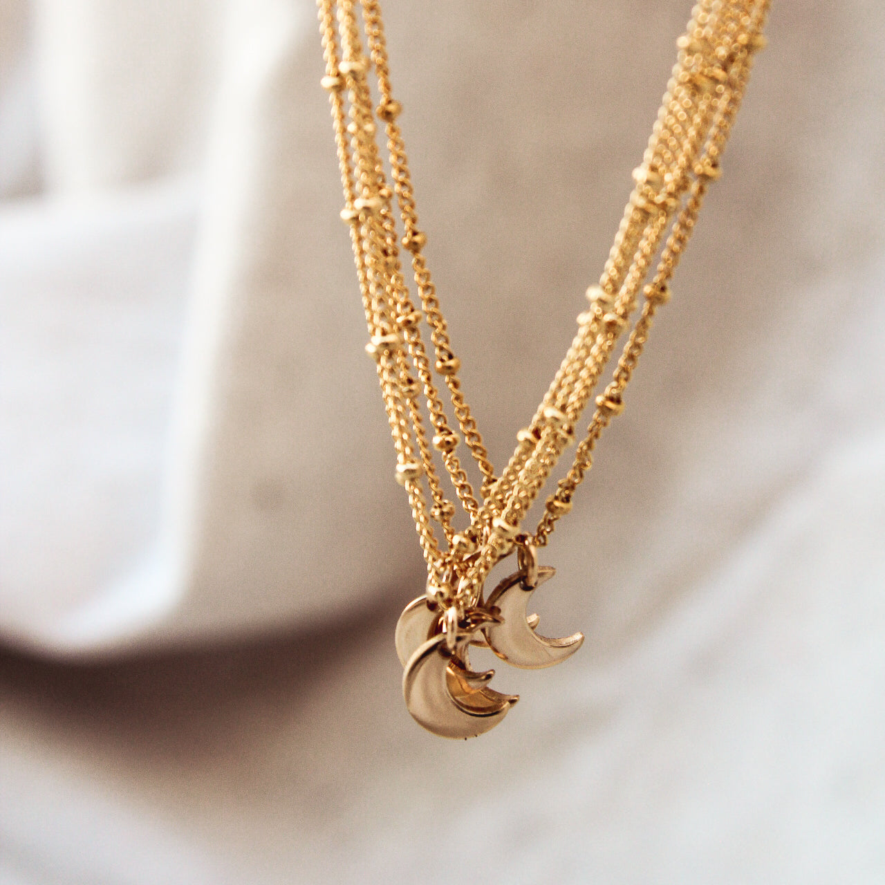 Waning crescent moon mini necklace