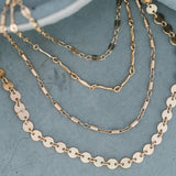 This gold choker is dashing and perfect for layering.