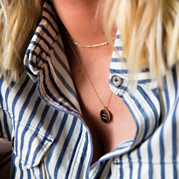 This gold choker is dashing and perfect for layering.