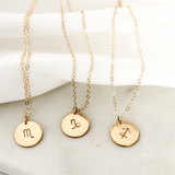 This necklace features a pendant that you can personalize with your zodiac sign.